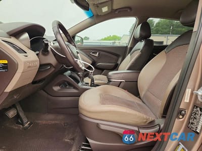 Zdjęcie 7 z 14 samochodu: 2012 HYUNDAI TUCSON GLS VIN:KM8JUCAC7CU373239 - miniatura