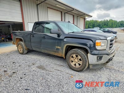 Czwarte zdjęcie samochodu z boku: 2015 GMC SIERRA C1500 SLE VIN:1GTR1UEC0FZ288878 - miniatura
