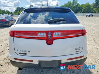 Zdjęcie 6 z 13 samochodu: 2015 LINCOLN MKT VIN:2LMHJ5AT1FBL04175 - miniatura