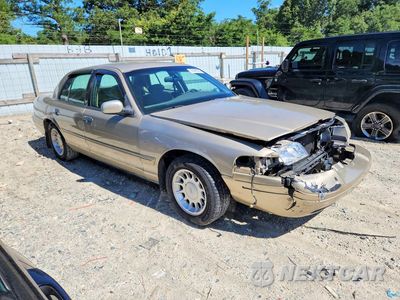 Czwarte zdjęcie samochodu z boku: 2000 FORD CROWN VICTORIA LX VIN:2FAFP74W1YX194540 - miniatura