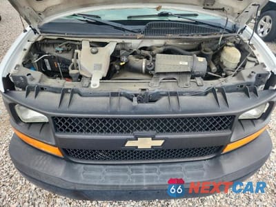 Zdjęcie 12 z 13 samochodu: 2014 CHEVROLET EXPRESS G1500 VIN:1GCSGAFX7E1153202 - miniatura