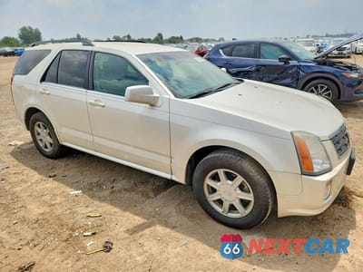Czwarte zdjęcie samochodu z boku: 2005 CADILLAC SRX VIN:1GYEE637350145456 - miniatura