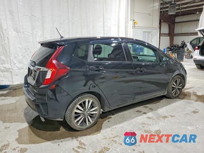 Trzecie zdjęcie samochodu z tyłu: 2015 HONDA FIT EX VIN:3HGGK5H87FM779839 - miniatura