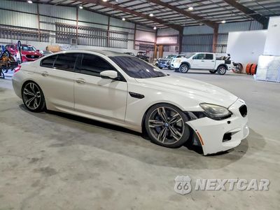 Czwarte zdjęcie samochodu z boku: 2015 BMW M6 GRAN COUPE VIN:WBS6C9C55FD468037 - miniatura