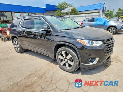 Czwarte zdjęcie samochodu z boku: 2019 CHEVROLET TRAVERSE LT VIN:1GNEVHKWXKJ188523 - miniatura