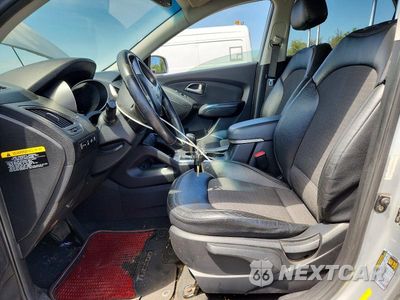 Zdjęcie 7 z 13 samochodu: 2012 HYUNDAI TUCSON GLS VIN:KM8JUCAC8CU395878 - miniatura
