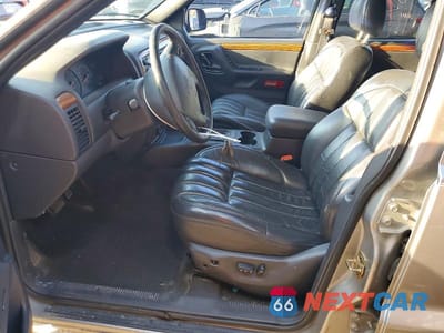 Zdjęcie 7 z 13 samochodu: 1999 JEEP GRAND CHEROKEE LIMITED VIN:1J4GW68N0XC527880 - miniatura
