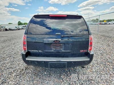 Zdjęcie 6 z 13 samochodu: 2014 GMC YUKON XL DENALI VIN:1GKS2MEF5ER198539 - miniatura