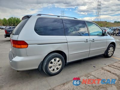 Trzecie zdjęcie samochodu z tyłu: 2004 HONDA ODYSSEY EXL VIN:5FNRL18944B121631 - miniatura