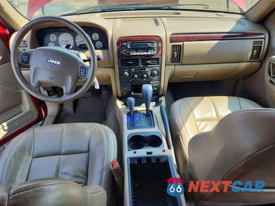 Zdjęcie 8 z 13 samochodu: 2002 JEEP GRAND CHEROKEE LIMITED VIN:1J4GW58N82C202381 - miniatura