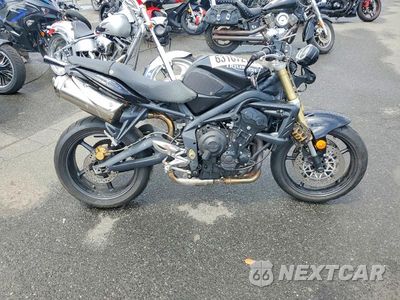 Trzecie zdjęcie samochodu z tyłu: 2010 TRIUMPH MOTORCYCLE STREET TRIPLE 675 VIN:SMTD01NE1AJ415157 - miniatura