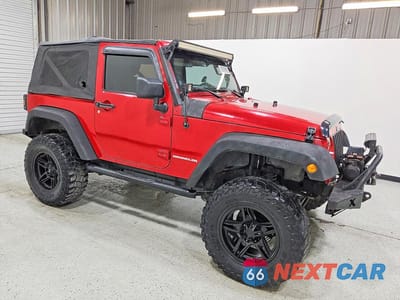 Czwarte zdjęcie samochodu z boku: 2011 JEEP WRANGLER SPORT VIN:1J4AA2D1XBL544369 - miniatura