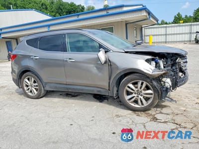 Czwarte zdjęcie samochodu z boku: 2015 HYUNDAI SANTA FE SPORT 2.0T VIN:5XYZWDLA0FG255462 - miniatura
