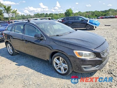 Czwarte zdjęcie samochodu z boku: 2015 VOLVO V60 PREMIER+ VIN:YV1612SC7F1213387 - miniatura