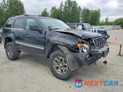 Czwarte zdjęcie samochodu z boku: 2006 JEEP GRAND CHEROKEE OVERLAND VIN:1J8HR68256C282492 - miniatura
