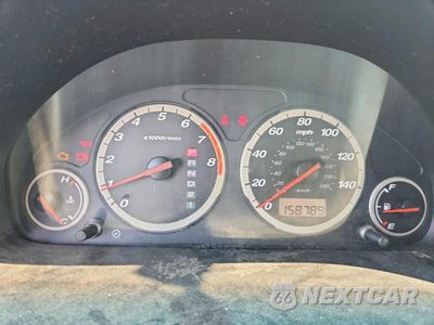 Zdjęcie 9 z 13 samochodu: 2004 HONDA CR-V LX VIN:JHLRD78424C037540 - miniatura