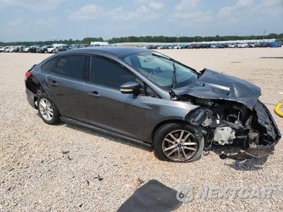 Czwarte zdjęcie samochodu z boku: 2017 FORD FOCUS SE VIN:1FADP3F29HL210507 - miniatura