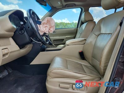 Zdjęcie 7 z 12 samochodu: 2012 HONDA PILOT EXL VIN:5FNYF3H57CB025504 - miniatura