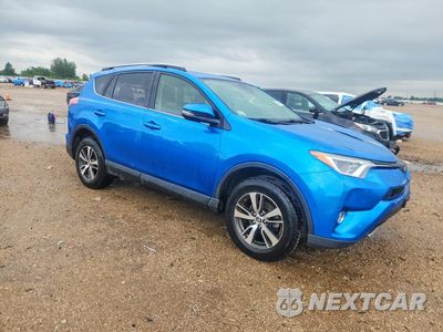 Czwarte zdjęcie samochodu z boku: 2018 TOYOTA RAV4 XLE VIN:JTMRFREV7JJ723127 - miniatura
