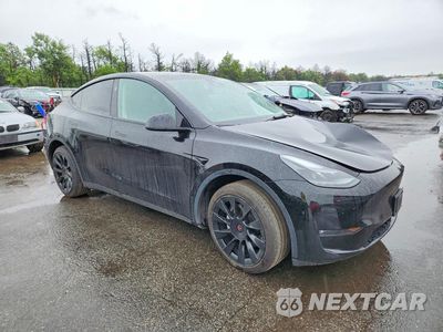 Czwarte zdjęcie samochodu z boku: 2023 TESLA MODEL Y VIN:7SAYGDEE5PF835455 - miniatura