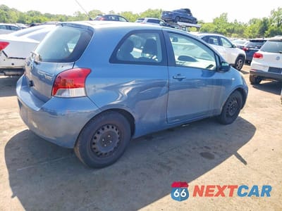 Trzecie zdjęcie samochodu z tyłu: 2009 TOYOTA YARIS BASE VIN:JTDJT903595230059 - miniatura