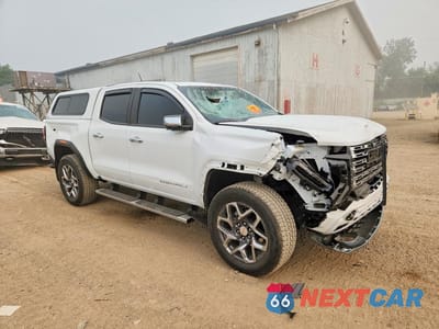 Czwarte zdjęcie samochodu z boku: 2024 GMC CANYON DENALI VIN:1GTP6FEK0R1294484 - miniatura