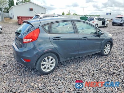 Trzecie zdjęcie samochodu z tyłu: 2011 FORD FIESTA SE VIN:3FADP4EJ6BM171184 - miniatura