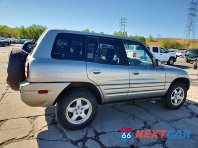 Trzecie zdjęcie samochodu z tyłu: 2000 TOYOTA RAV4 BASE VIN:JT3HP10V2Y7170075 - miniatura