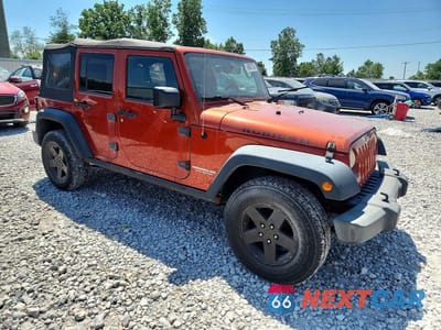 Czwarte zdjęcie samochodu z boku: 2009 JEEP WRANGLER UNLIMITED RUBICON VIN:1J4GA691X9L749677 - miniatura