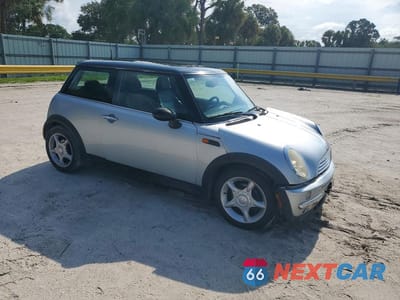 Czwarte zdjęcie samochodu z boku: 2002 MINI COOPER VIN:WMWRC334X2TC37790 - miniatura