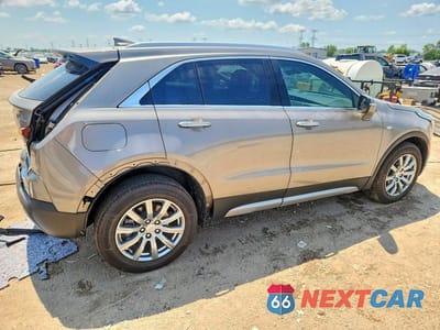 Trzecie zdjęcie samochodu z tyłu: 2023 CADILLAC XT4 PREMIUM LUXURY VIN:1GYFZDR4XPF143567 - miniatura