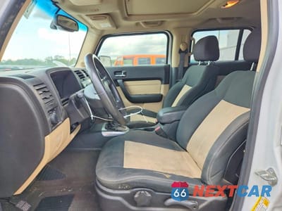 Zdjęcie 7 z 12 samochodu: 2006 HUMMER H3 VIN:5GTDN136868164477 - miniatura