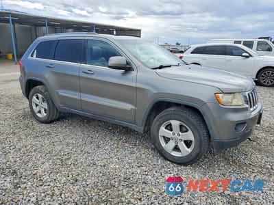 Czwarte zdjęcie samochodu z boku: 2011 JEEP GRAND CHEROKEE LAREDO VIN:1J4RR4GT2BC578519 - miniatura