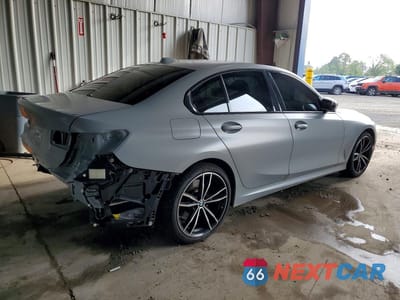 Trzecie zdjęcie samochodu z tyłu: 2023 BMW 330XI VIN:3MW89FF0XP8D66502 - miniatura