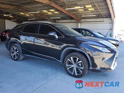 Czwarte zdjęcie samochodu z boku: 2017 LEXUS RX 350 BASE VIN:2T2ZZMCA3HC045360 - miniatura