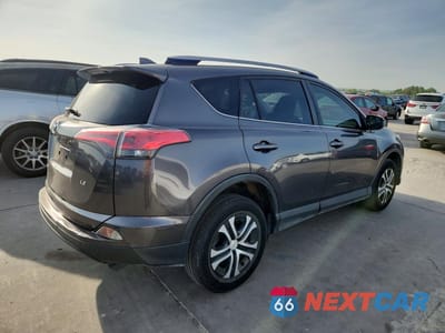 Trzecie zdjęcie samochodu z tyłu: 2018 TOYOTA RAV4 LE VIN:JTMZFREV9JJ740799 - miniatura