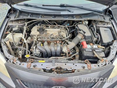 Zdjęcie 11 z 12 samochodu: 2010 TOYOTA COROLLA LE VIN:JTDBU4EE9AJ055356 - miniatura