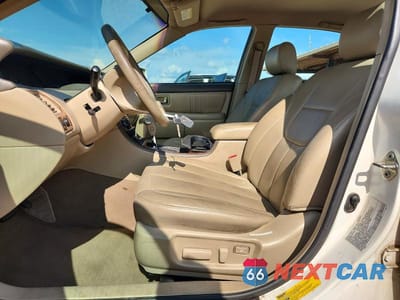 Zdjęcie 7 z 12 samochodu: 2003 TOYOTA AVALON XL VIN:4T1BF28B23U303511 - miniatura
