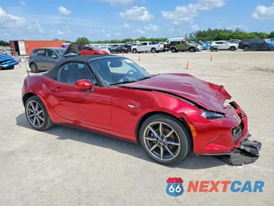 Czwarte zdjęcie samochodu z boku: 2022 MAZDA MX-5 MIATA GRAND TOURING VIN:JM1NDAD78N0504858 - miniatura