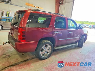 Trzecie zdjęcie samochodu z tyłu: 2010 CHEVROLET TAHOE K1500 LTZ VIN:1GNUKCE02AR110199 - miniatura