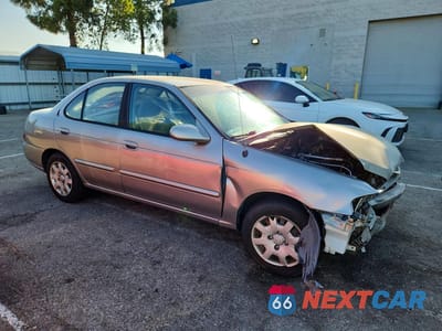Czwarte zdjęcie samochodu z boku: 2001 NISSAN SENTRA XE VIN:3N1CB51D11L436708 - miniatura