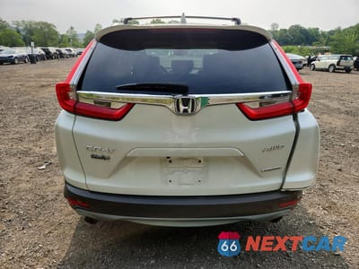 Zdjęcie 6 z 13 samochodu: 2017 HONDA CR-V TOURING VIN:5J6RW2H9XHL006641 - miniatura
