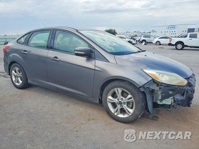 Czwarte zdjęcie samochodu z boku: 2014 FORD FOCUS SE VIN:1FADP3F2XEL165783 - miniatura