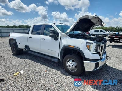 Czwarte zdjęcie samochodu z boku: 2023 GMC SIERRA K3500 VIN:1GT49SEY8PF107905 - miniatura