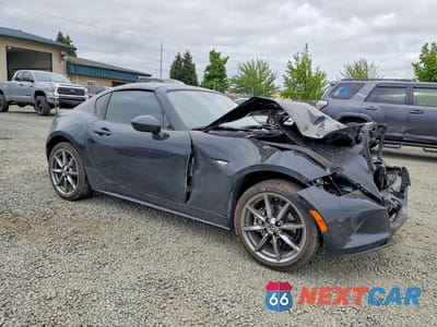 Czwarte zdjęcie samochodu z boku: 2022 MAZDA MX-5 MIATA GRAND TOURING VIN:JM1NDAM77N0505788 - miniatura