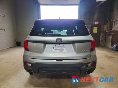 Zdjęcie 6 z 13 samochodu: 2023 HONDA PASSPORT EXL VIN:5FNYF8H5XPB006657 - miniatura