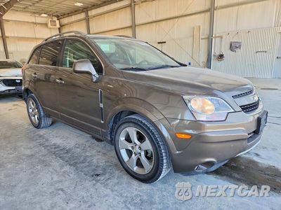 Czwarte zdjęcie samochodu z boku: 2014 CHEVROLET CAPTIVA LTZ VIN:3GNAL4EK7ES650450 - miniatura