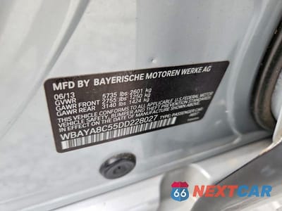 Zdjęcie 12 z 12 samochodu: 2013 BMW 750 I VIN:WBAYA8C55DD228027 - miniatura