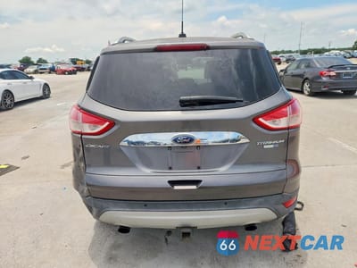 Zdjęcie 6 z 13 samochodu: 2014 FORD ESCAPE TITANIUM VIN:1FMCU9J99EUE52589 - miniatura