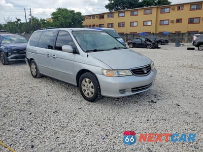 Czwarte zdjęcie samochodu z boku: 2002 HONDA ODYSSEY EXL VIN:5FNRL18992B039925 - miniatura
